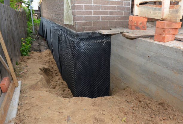 Happy homeowners after waterproofing job in Lupton City